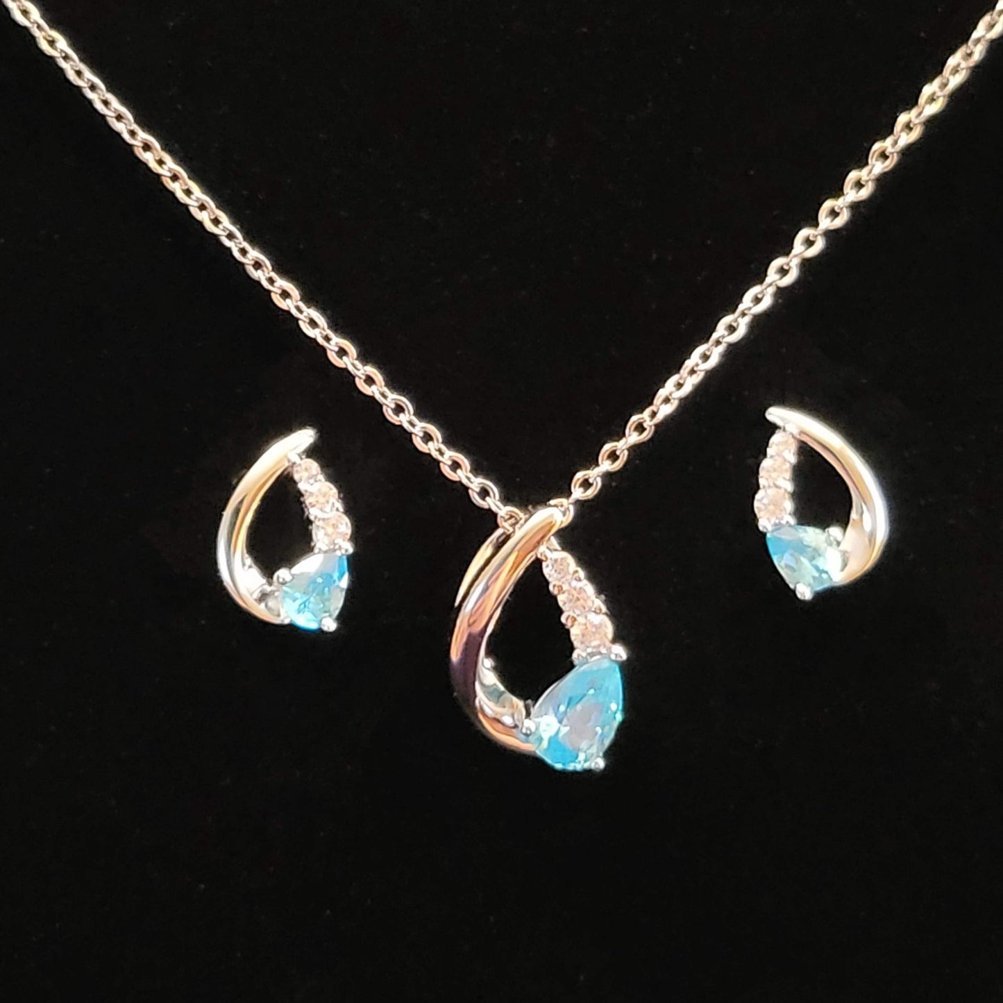 Nora: Rhodium-plated .925 Sterling Aquamarine Teardrop Earrings