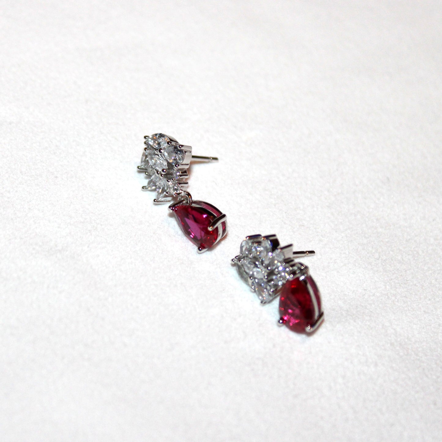 Theresa: Rhodium-plated .925 Sterling Marquise Diamond with teardrop Ruby Earrings