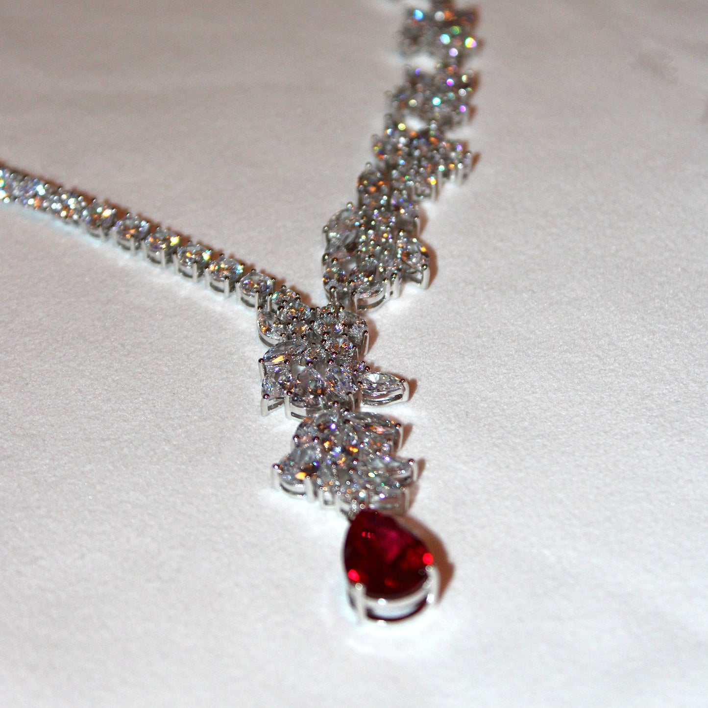 Theresa: Rhodium-plated .925 Sterling Marquise Diamond with teardrop Ruby Earrings