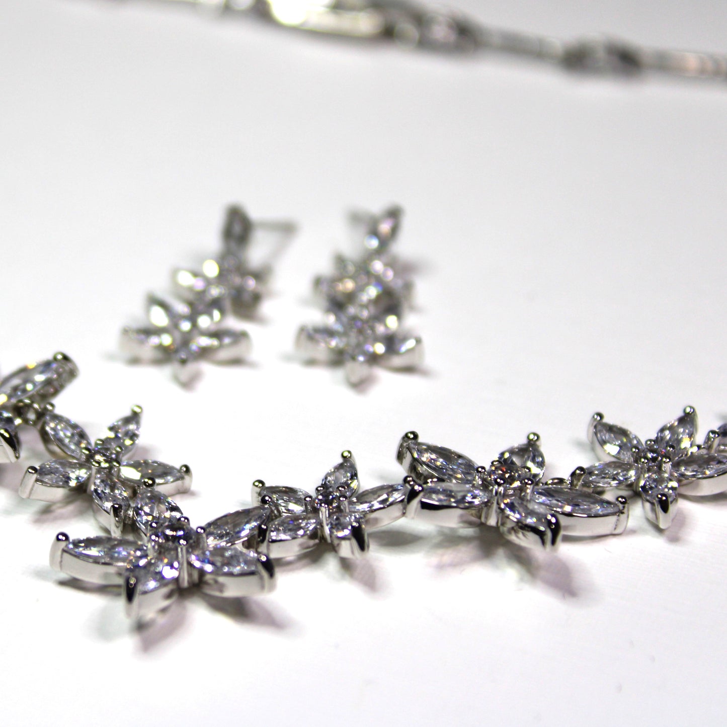 Amanda: Rhodium-plated .925 Sterling lab-created Marquise Diamond Necklace and Earrings Set