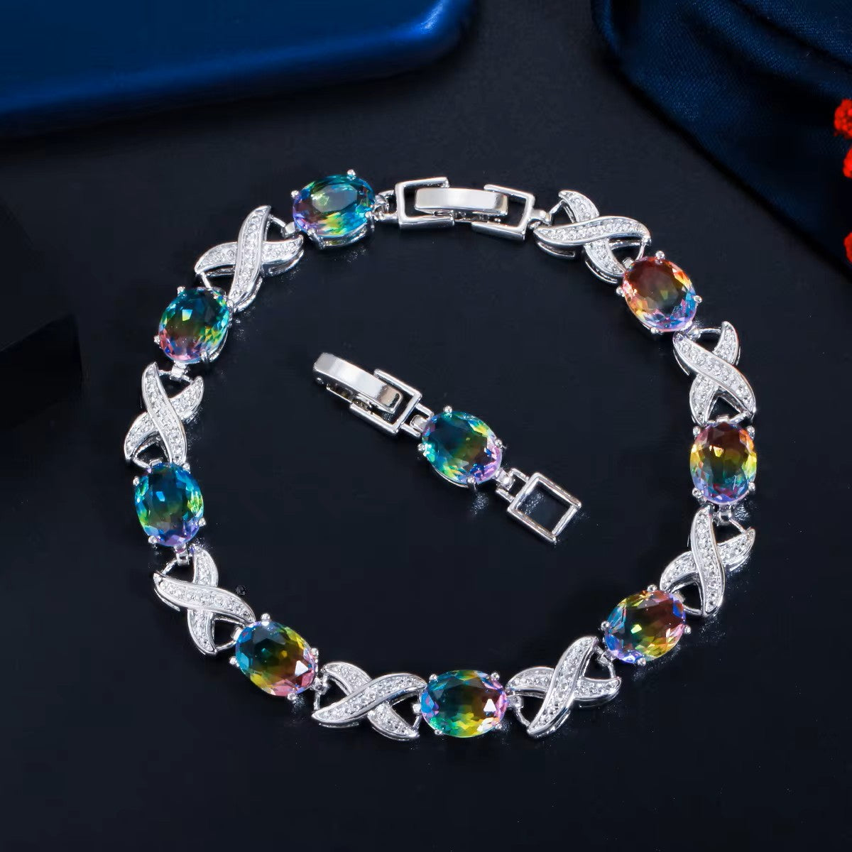 Oval lab-created Mystic Topaz XOXO White Gold-Plated Link Bracelet