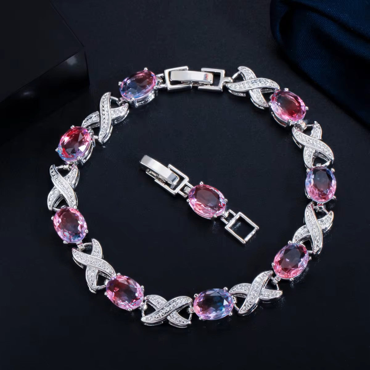 Oval lab-created Mystic Topaz XOXO White Gold-Plated Link Bracelet