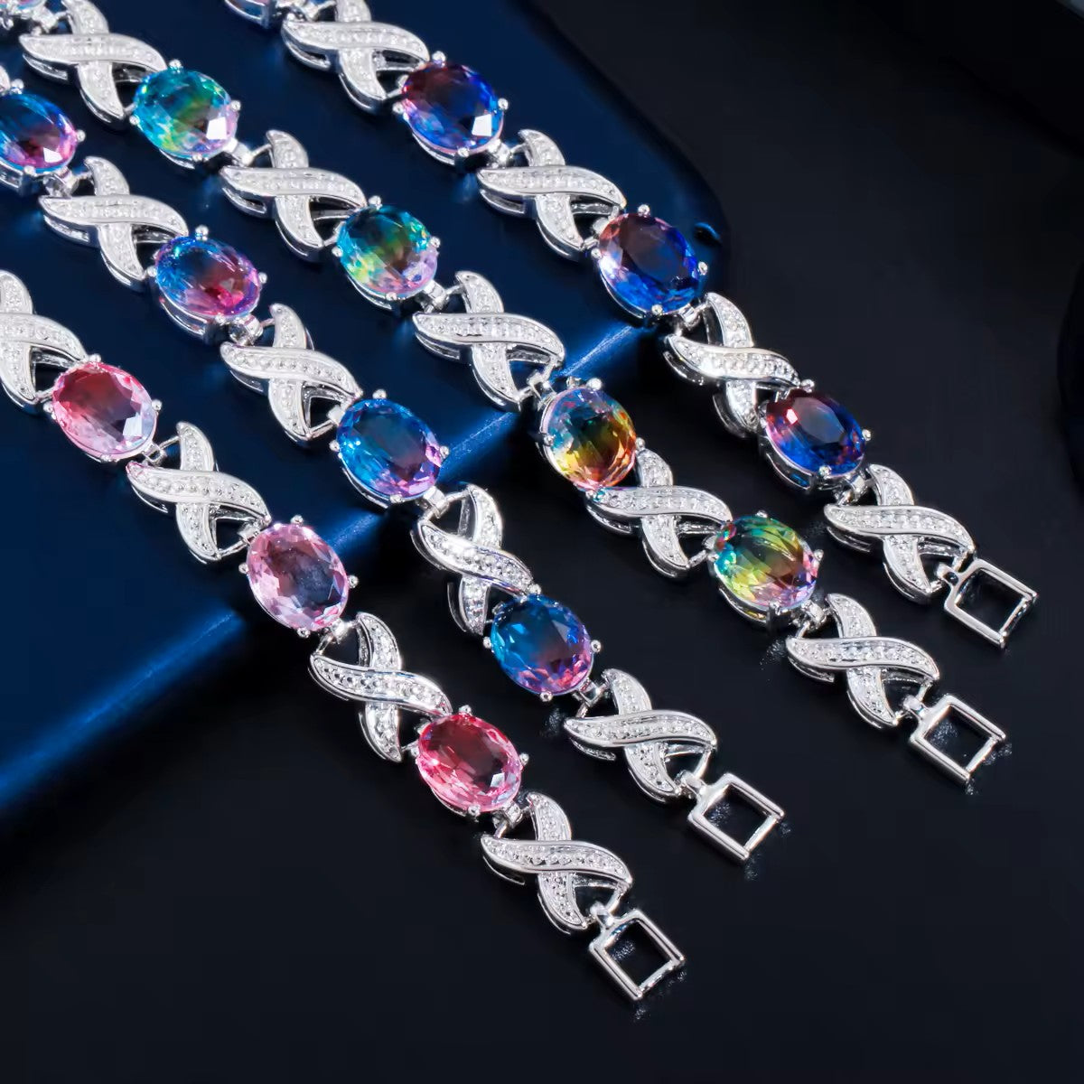 Oval lab-created Mystic Topaz XOXO White Gold-Plated Link Bracelet