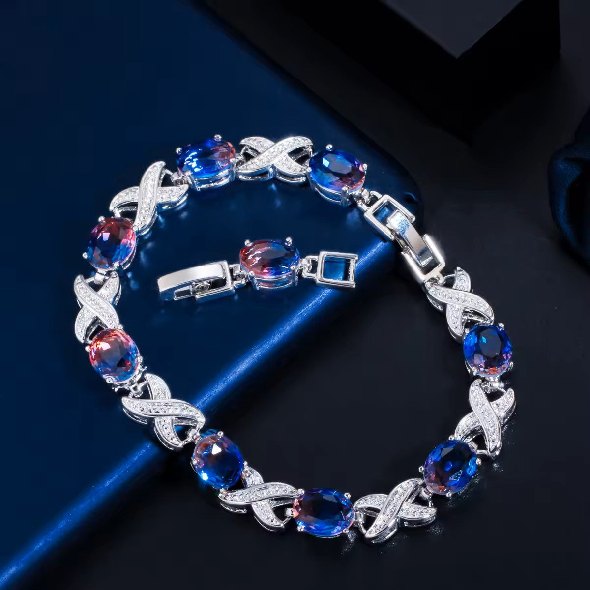 Oval lab-created Mystic Topaz XOXO White Gold-Plated Link Bracelet