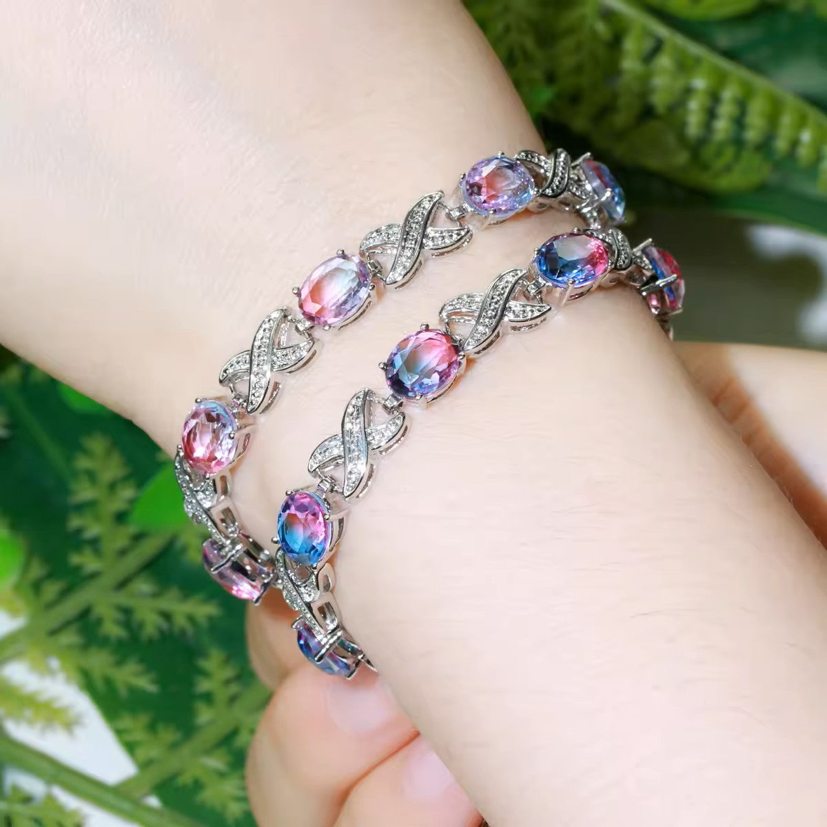 Oval lab-created Mystic Topaz XOXO White Gold-Plated Link Bracelet