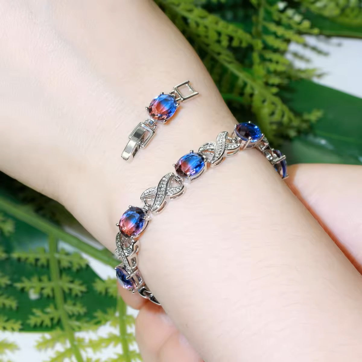 Oval lab-created Mystic Topaz XOXO White Gold-Plated Link Bracelet