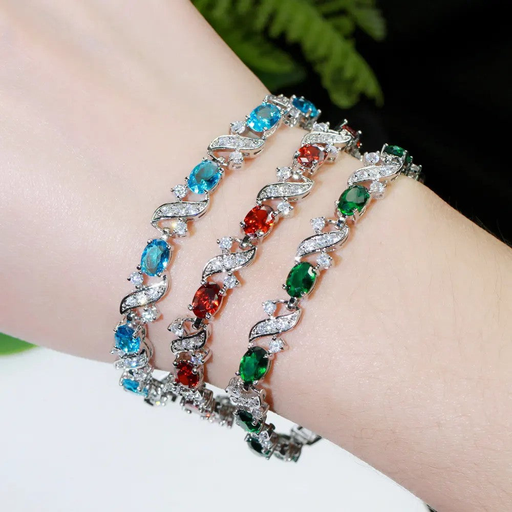 XOXO Gemstone Link Bracelet in White Gold Plating