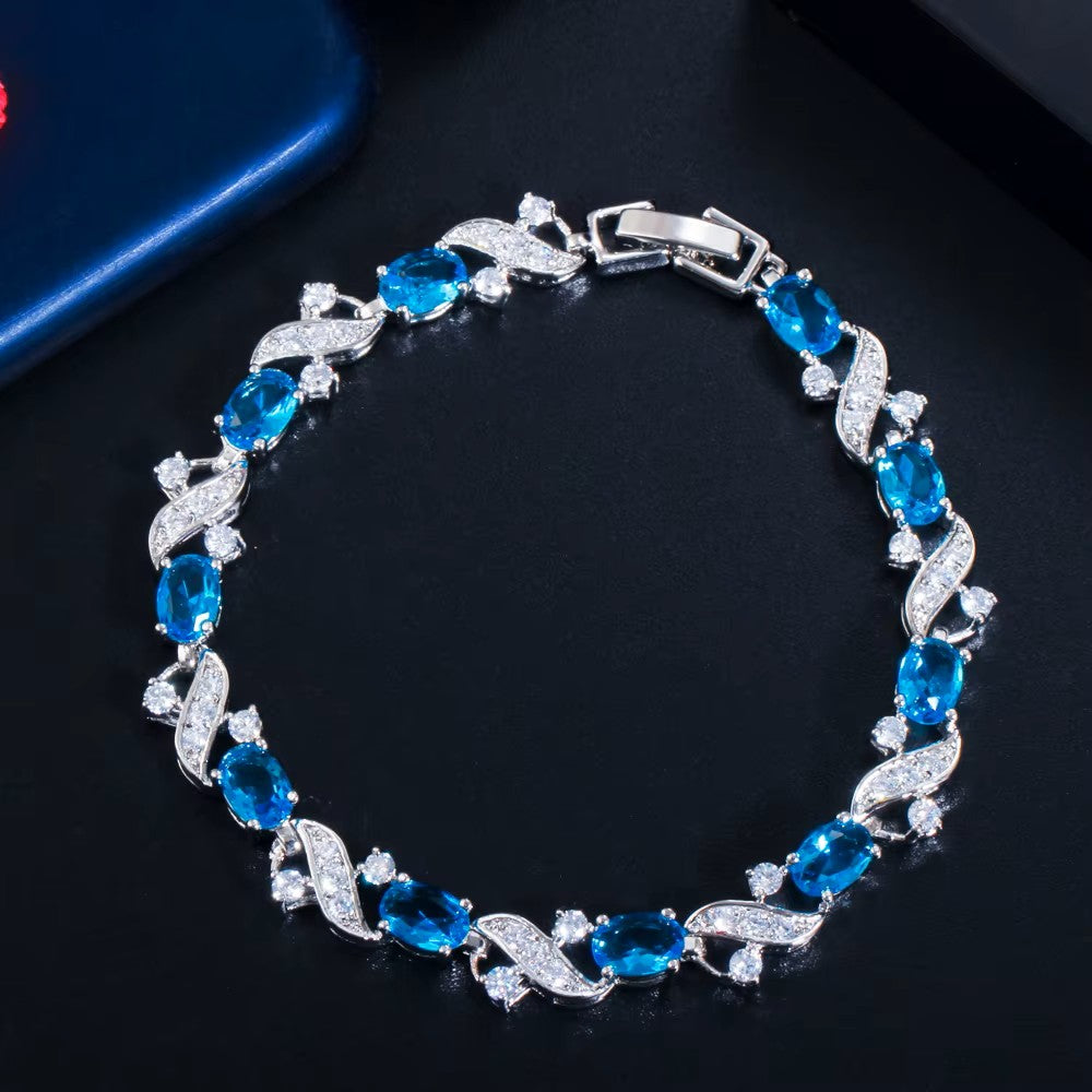 XOXO Gemstone Link Bracelet in White Gold Plating