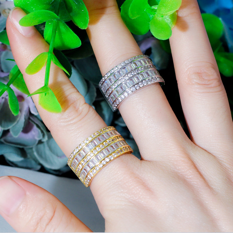 18k Gold-Plated Emerald Cut Channel Set Cubic Zirconia Band Ring in White or Yellow Gold
