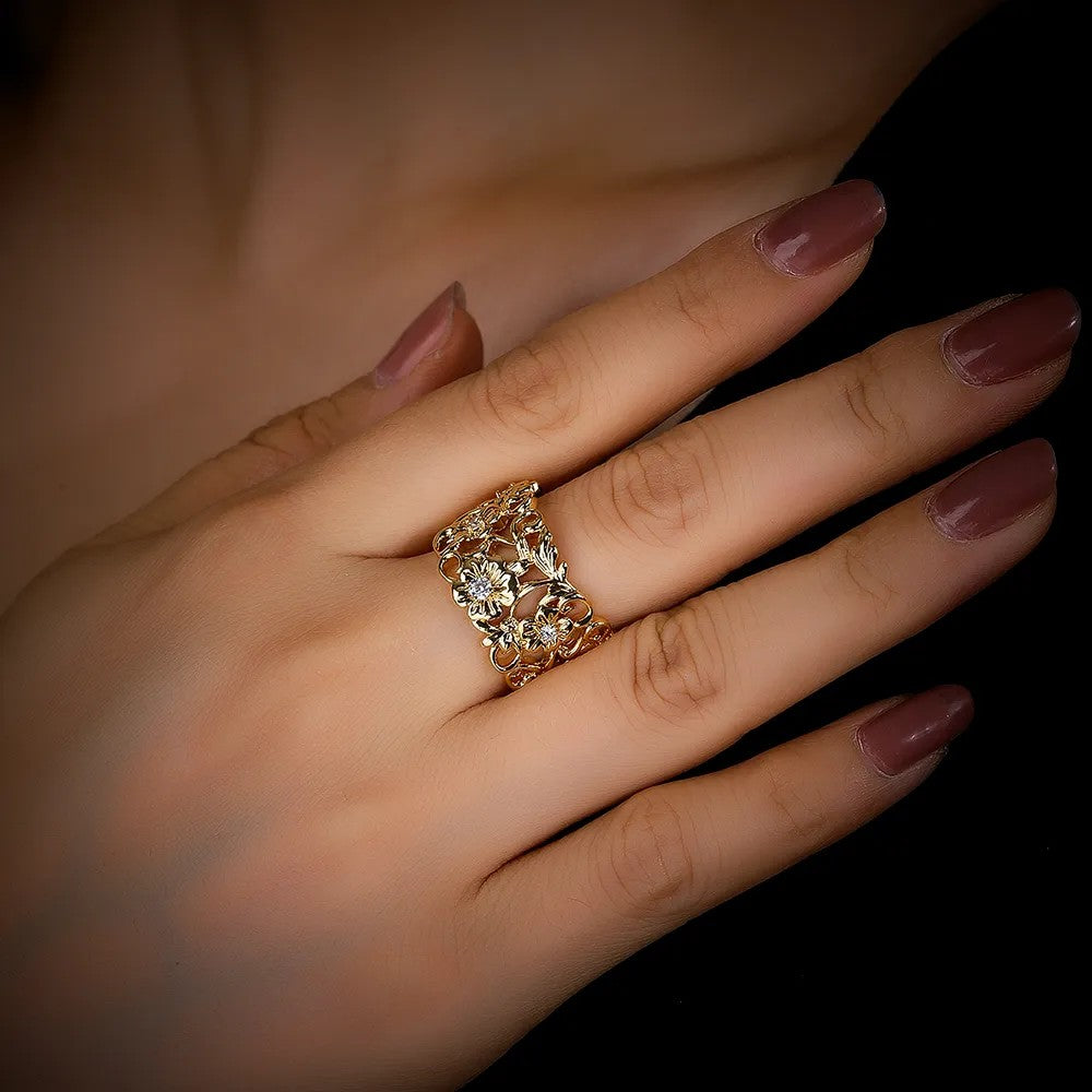 Gold floral band ring with lab-created diamond accent