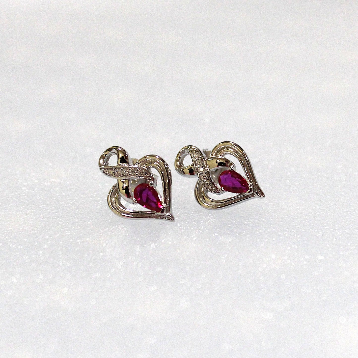 Melanie: Rhodium-plated .925 Sterling lab-created Ruby Ribbon Heart Necklace