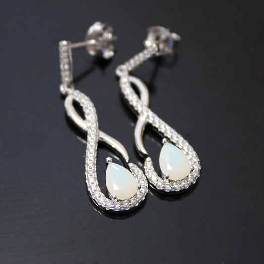 Shelby: Rhodium-plated .925 Sterling lab-created Opal Teardrop Infinity Earrings