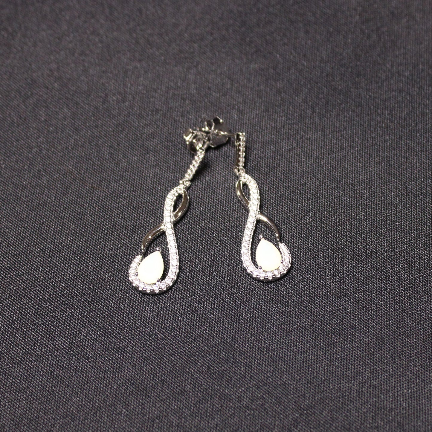 Shelby: Rhodium-plated .925 Sterling lab-created Opal Teardrop Infinity Necklace