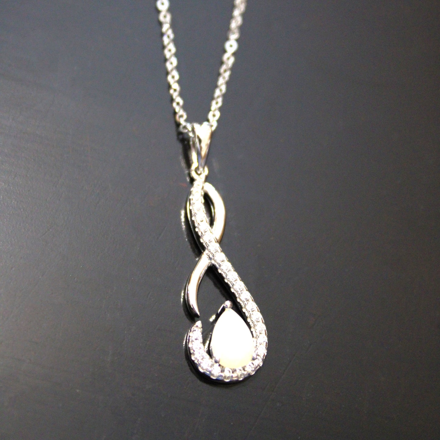 Shelby: Rhodium-plated .925 Sterling lab-created Opal Teardrop Infinity Necklace