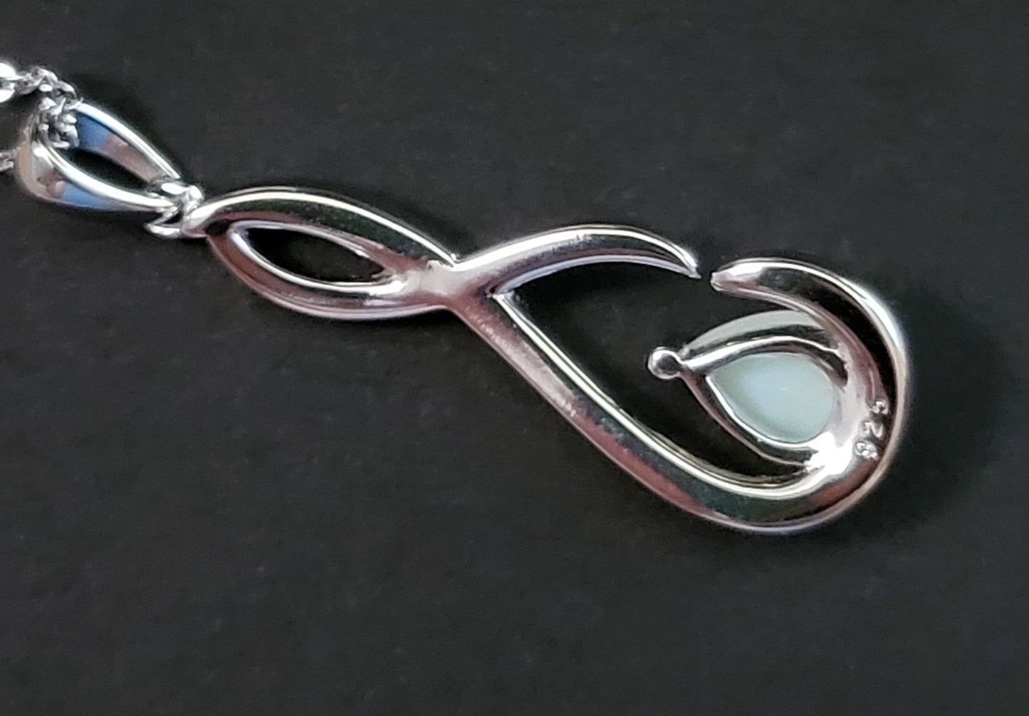 Shelby: Rhodium-plated .925 Sterling lab-created Opal Teardrop Infinity Necklace