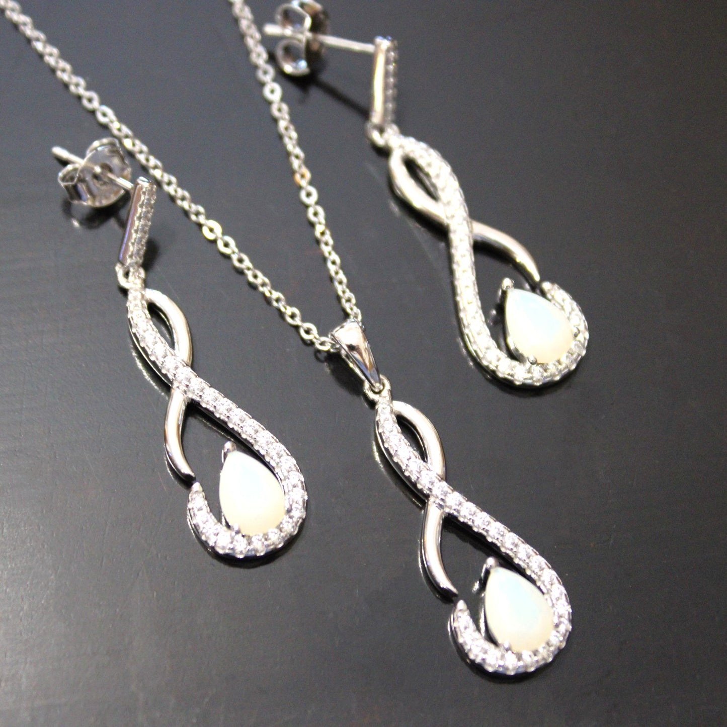 Shelby: Rhodium-plated .925 Sterling lab-created Opal Teardrop Infinity Necklace