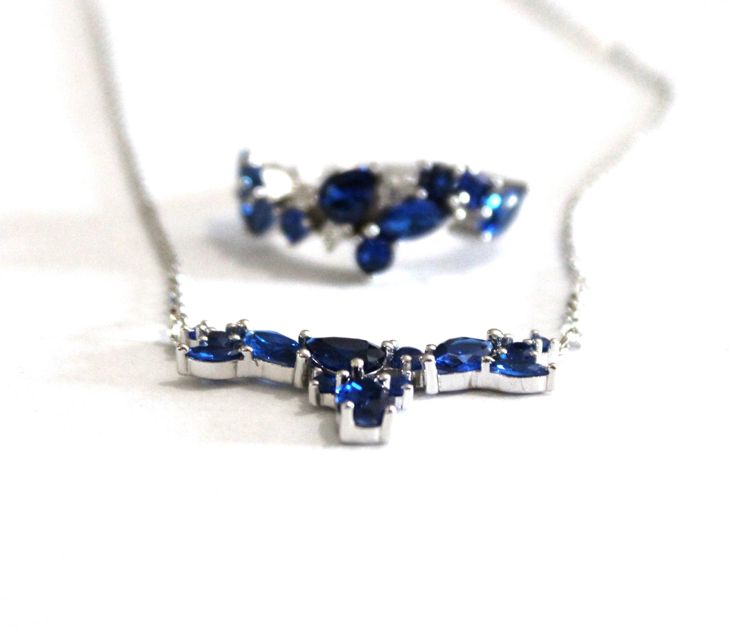 Skylar: Rhodium-plated .925 Sterling lab-created Sapphire Cluster Necklace