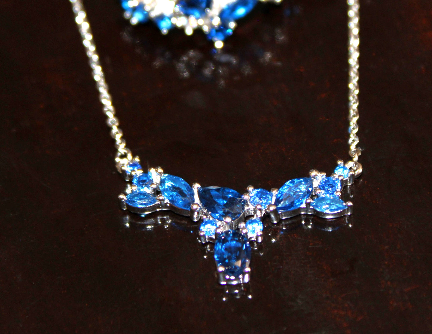 Skylar: Rhodium-plated .925 Sterling lab-created Sapphire Cluster Necklace