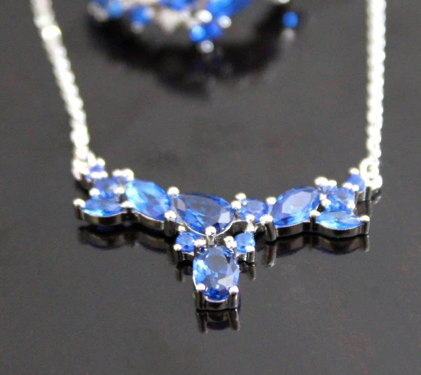 Skylar: Rhodium-plated .925 Sterling lab-created Sapphire Cluster Necklace