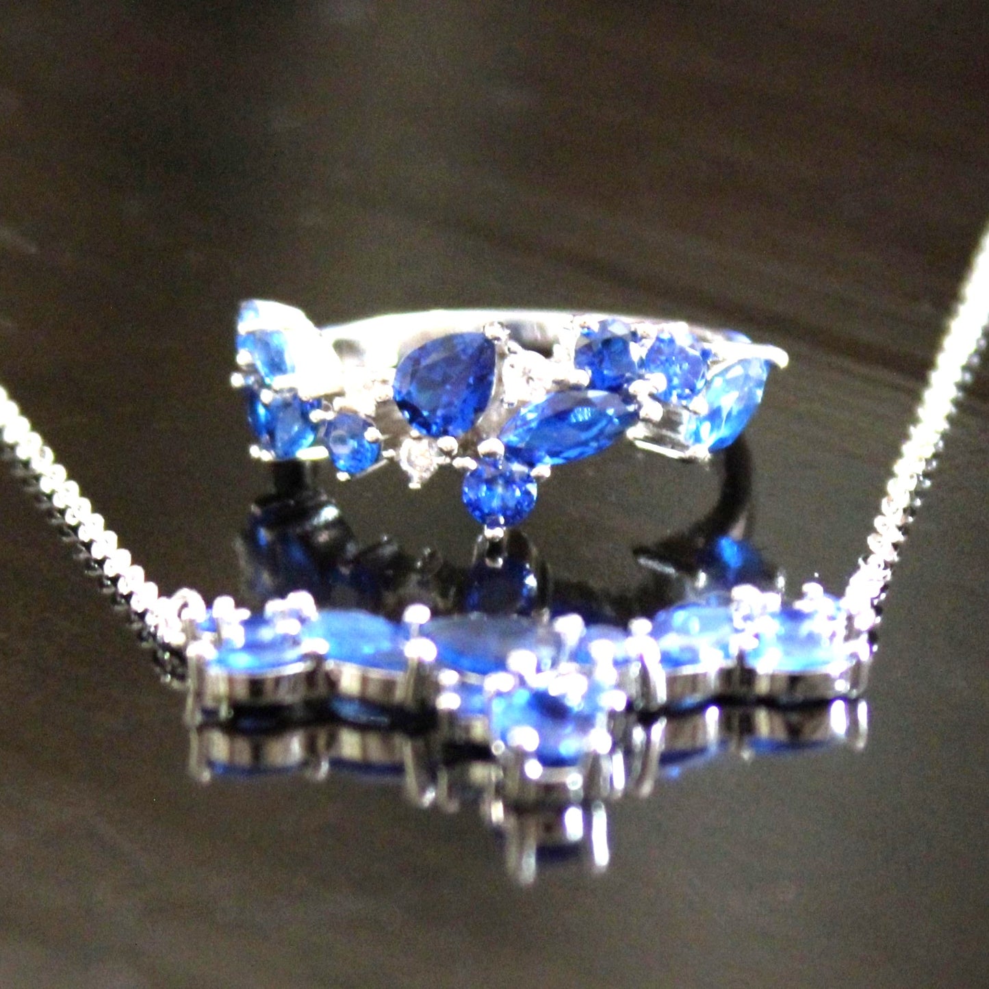 Skylar: Rhodium-plated .925 Sterling lab-created Sapphire Cluster Necklace