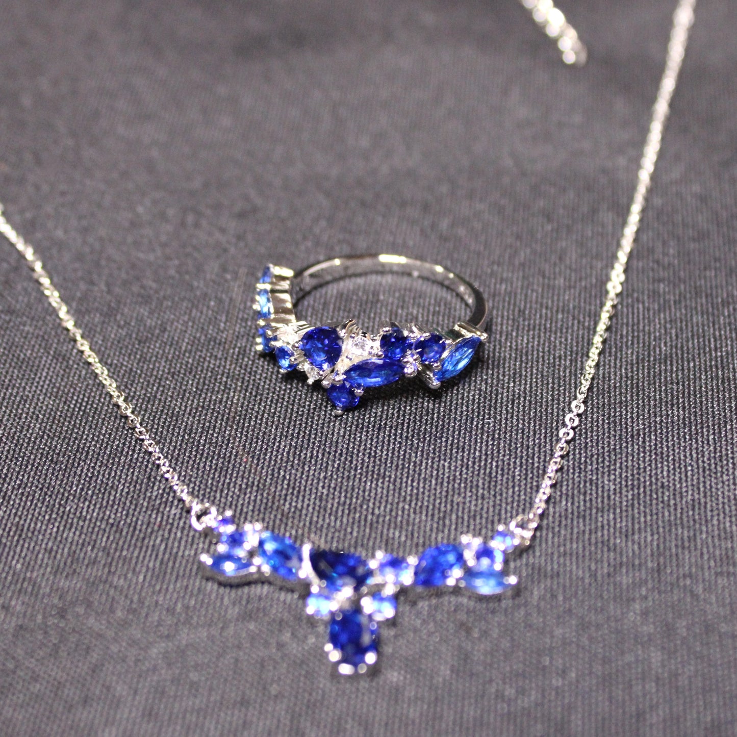 Skylar: Rhodium-plated .925 Sterling lab-created Sapphire Cluster Necklace