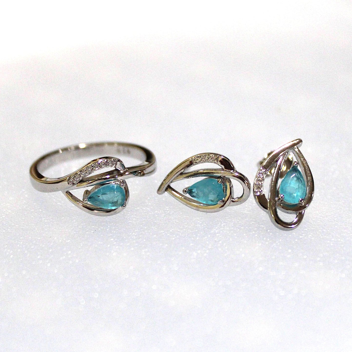Dana: Rhodium-plated .925 Sterling Aquamarine Teardrop Earrings