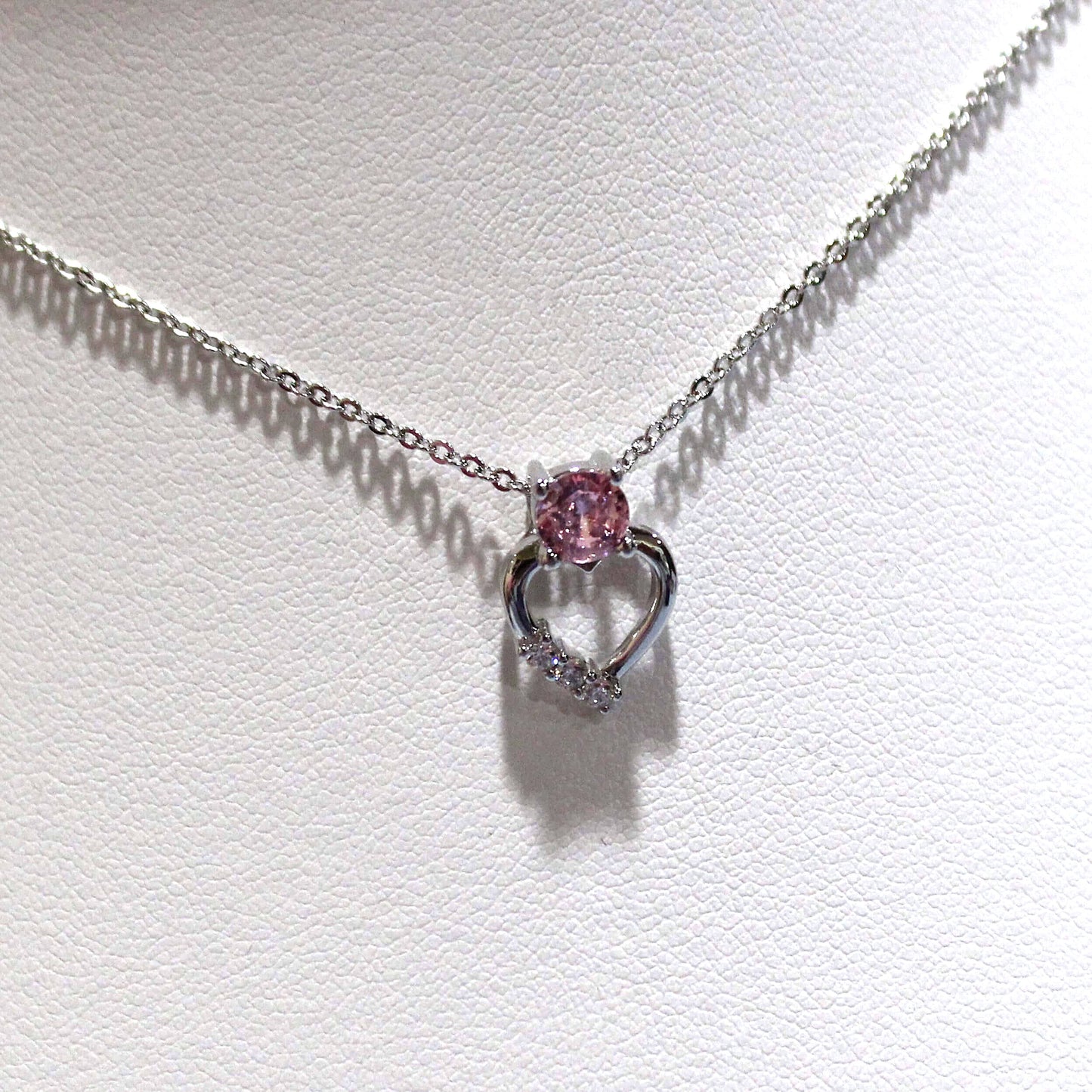 Zoey: Rhodium-plated .925 Sterling Heart Charm with lab-created Pink Sapphire Heart Drop Earrings