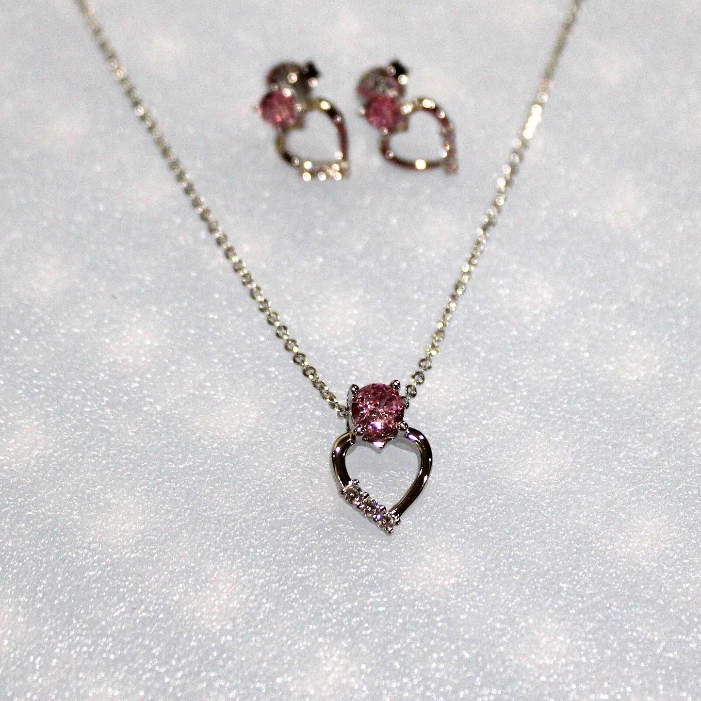 Zoey: Rhodium-plated .925 Sterling Heart Charm with lab-created Pink Sapphire Heart Drop Earrings