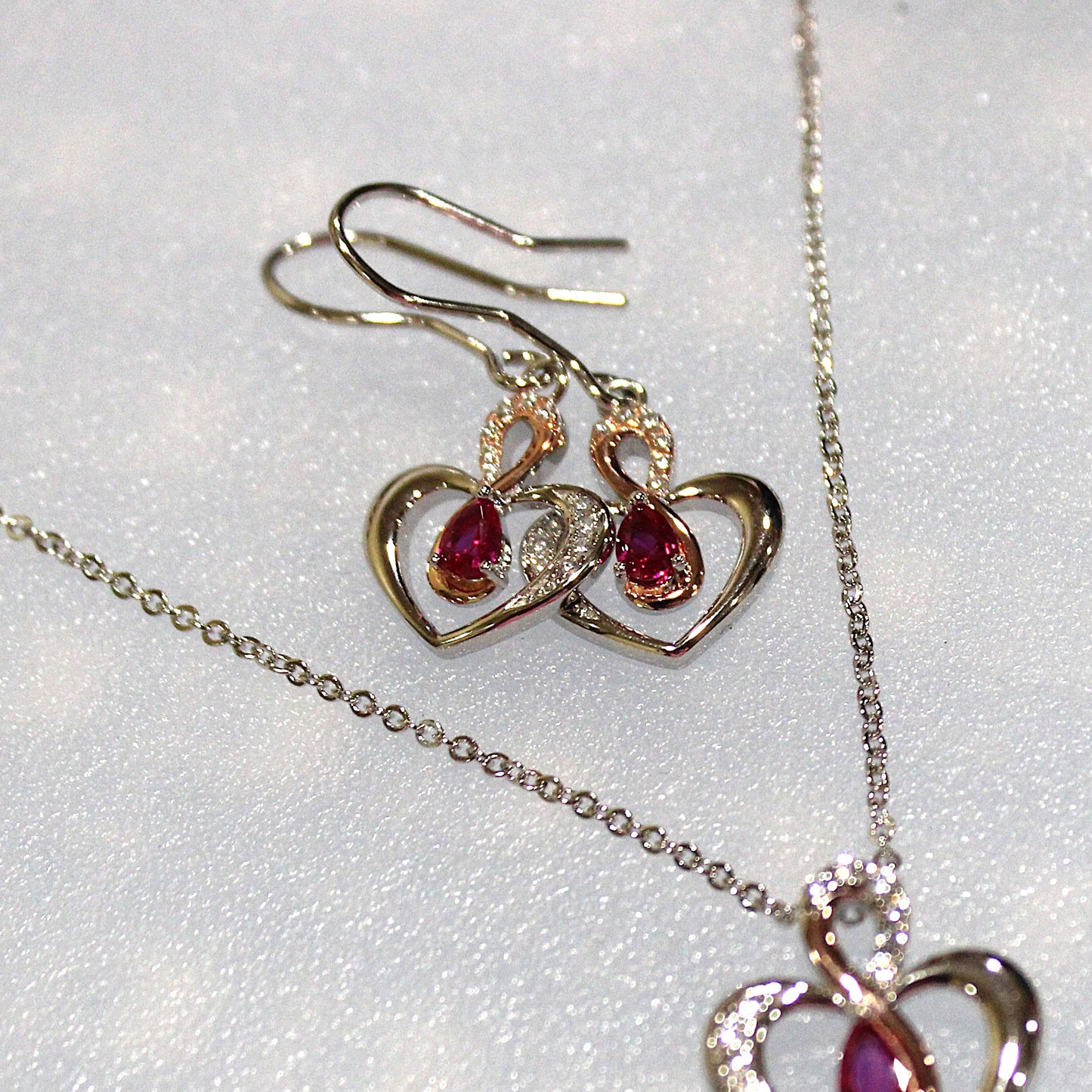 Leanne: Rhodium-plated .925 Sterling lab-created Ruby in Two Tone Heart Necklace