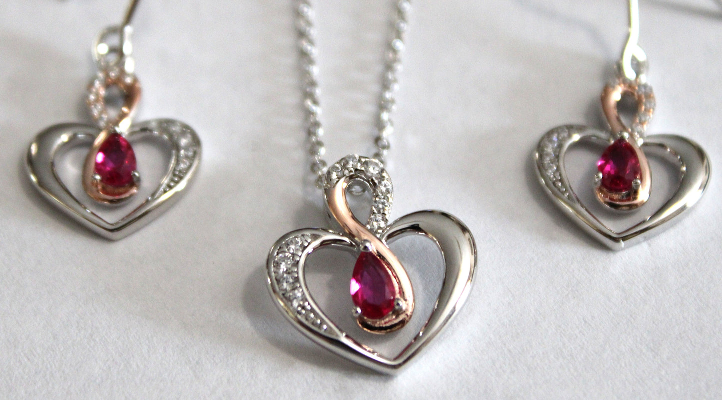 Leanne: Rhodium-plated .925 Sterling lab-created Ruby in Two Tone Heart Necklace