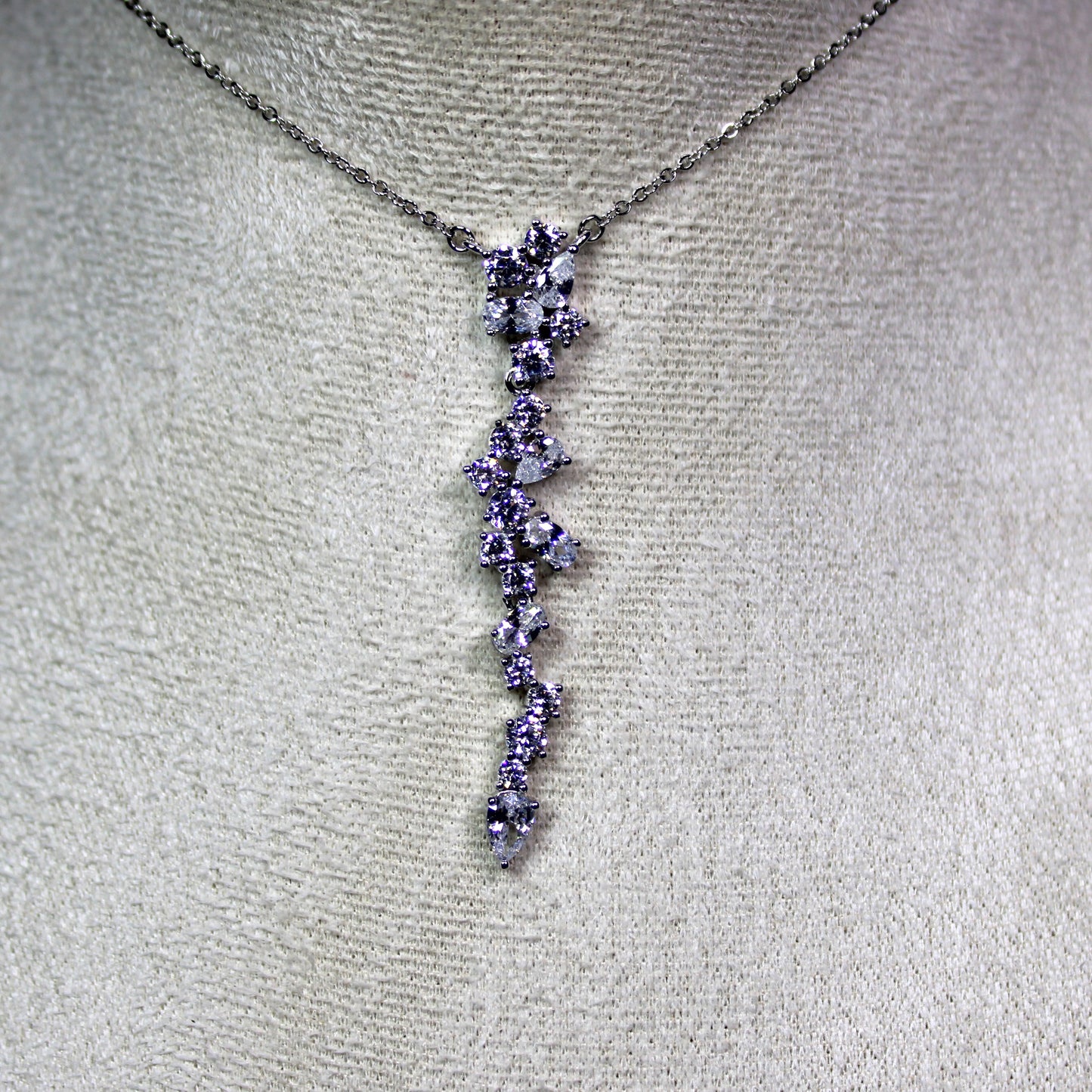 Angela: Rhodium-plated .925 Sterling lab-created Round and Pear Diamond Cluster Drop Set