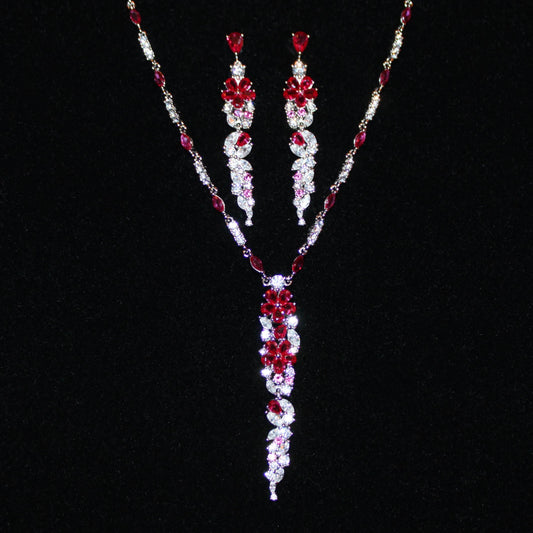 Cassandra: Rhodium-plated .925 Sterling Round Diamond and Teardrop Ruby Necklace and Earrings (Set)