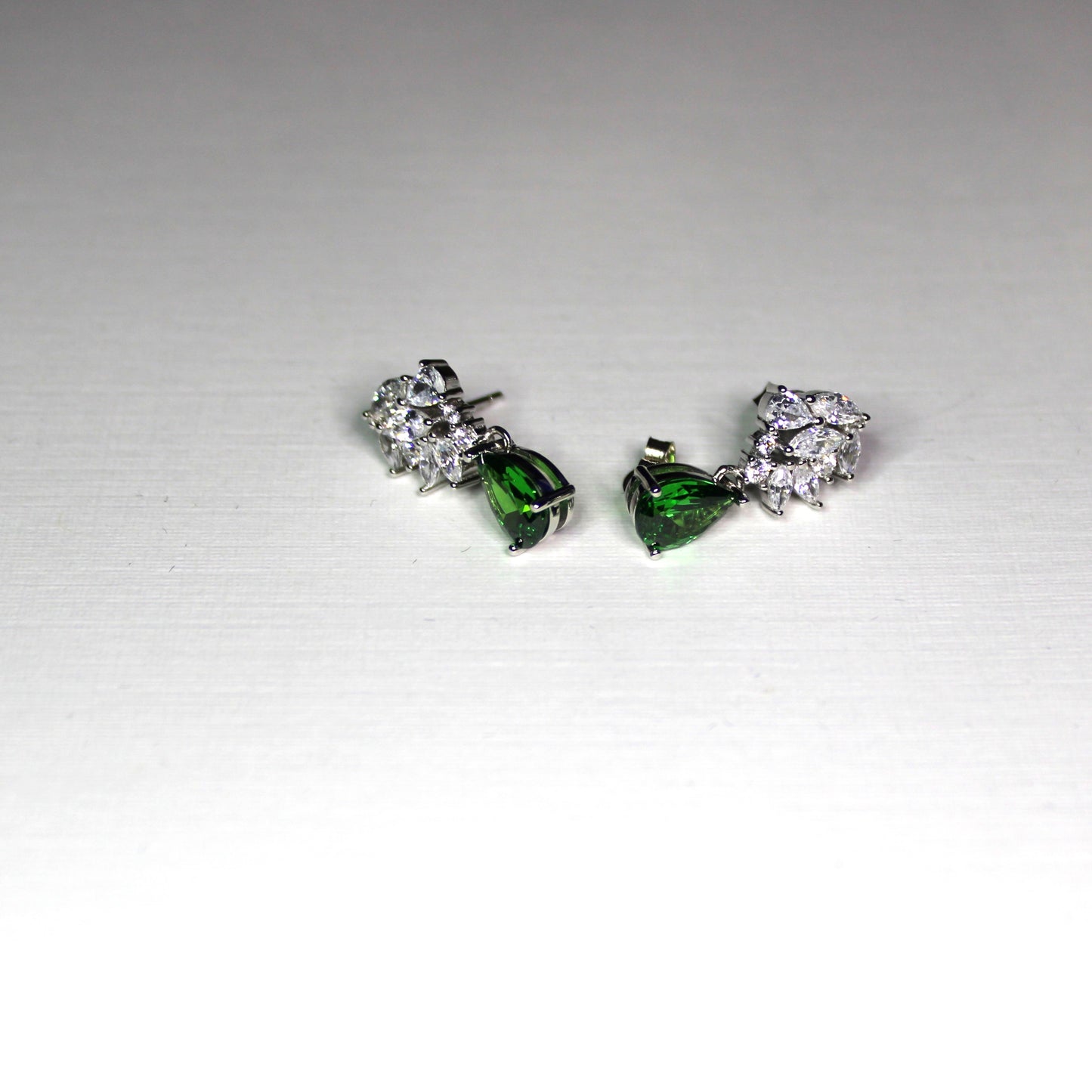 Emma: Rhodium-plated .925 Sterling Marquise Diamond with Teardrop Emerald Earrings