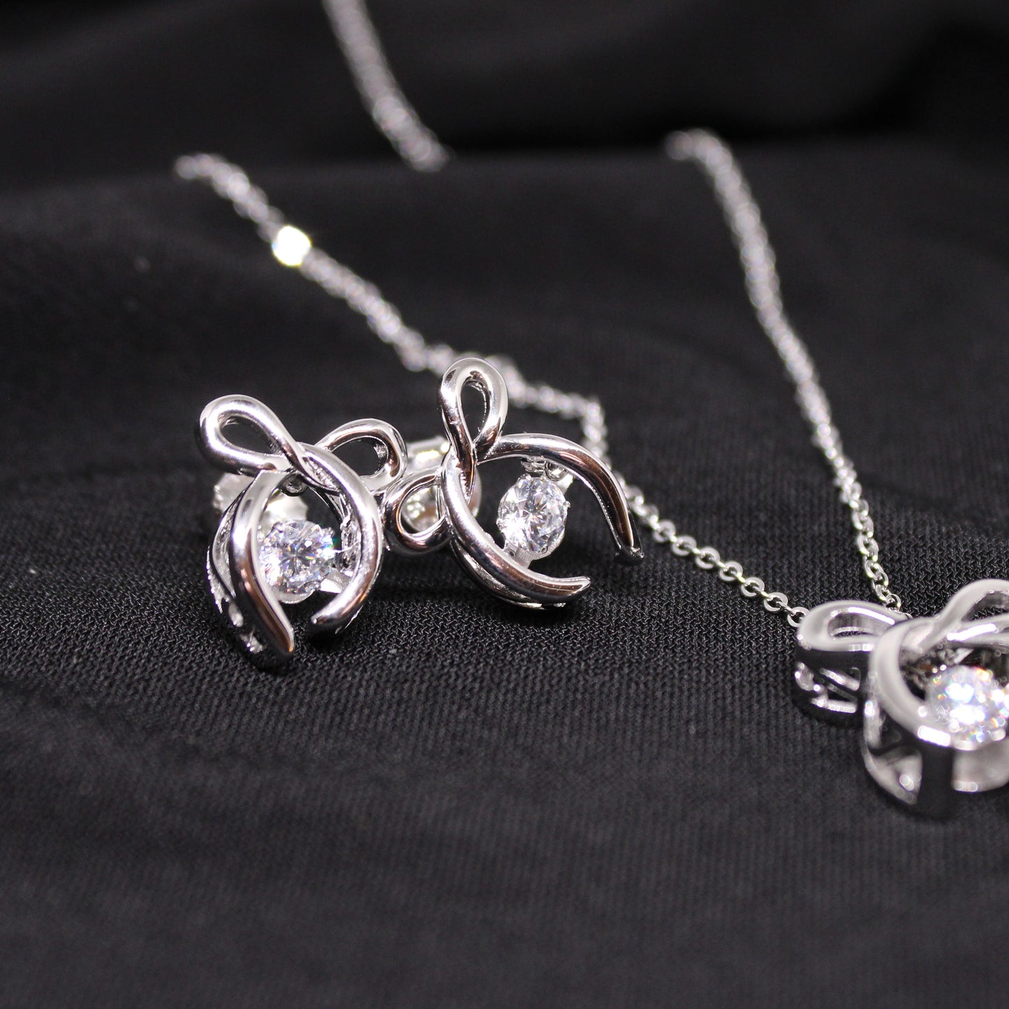 Rhodium Plated .925 Sterling lab-created Diamond Ribbon Necklace