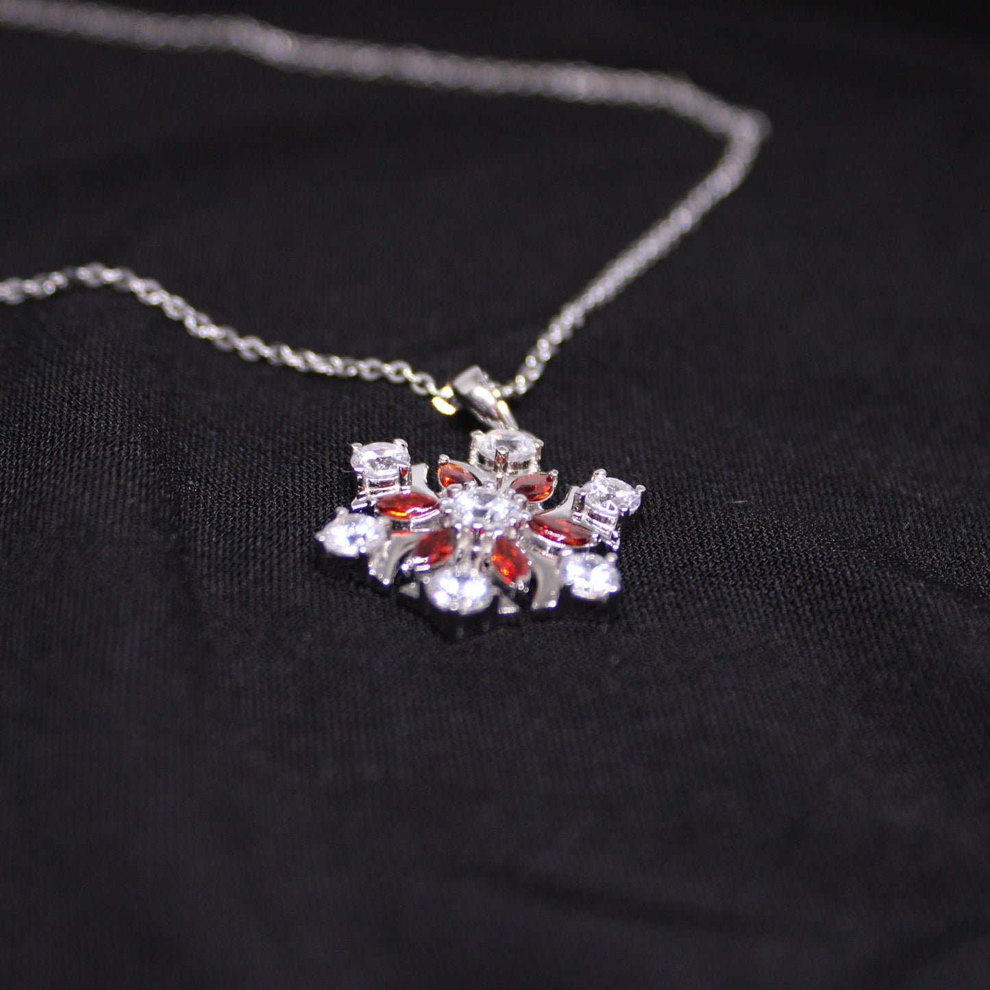 Rhodium-plated .925 Sterling lab-created Garnet Snowflake Necklace