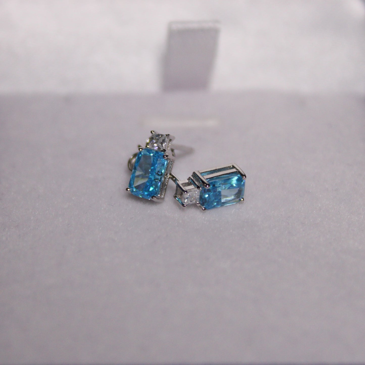 Rhodium-plated .925 Sterling lab-created Emerald Cut Aquamarine Earrings
