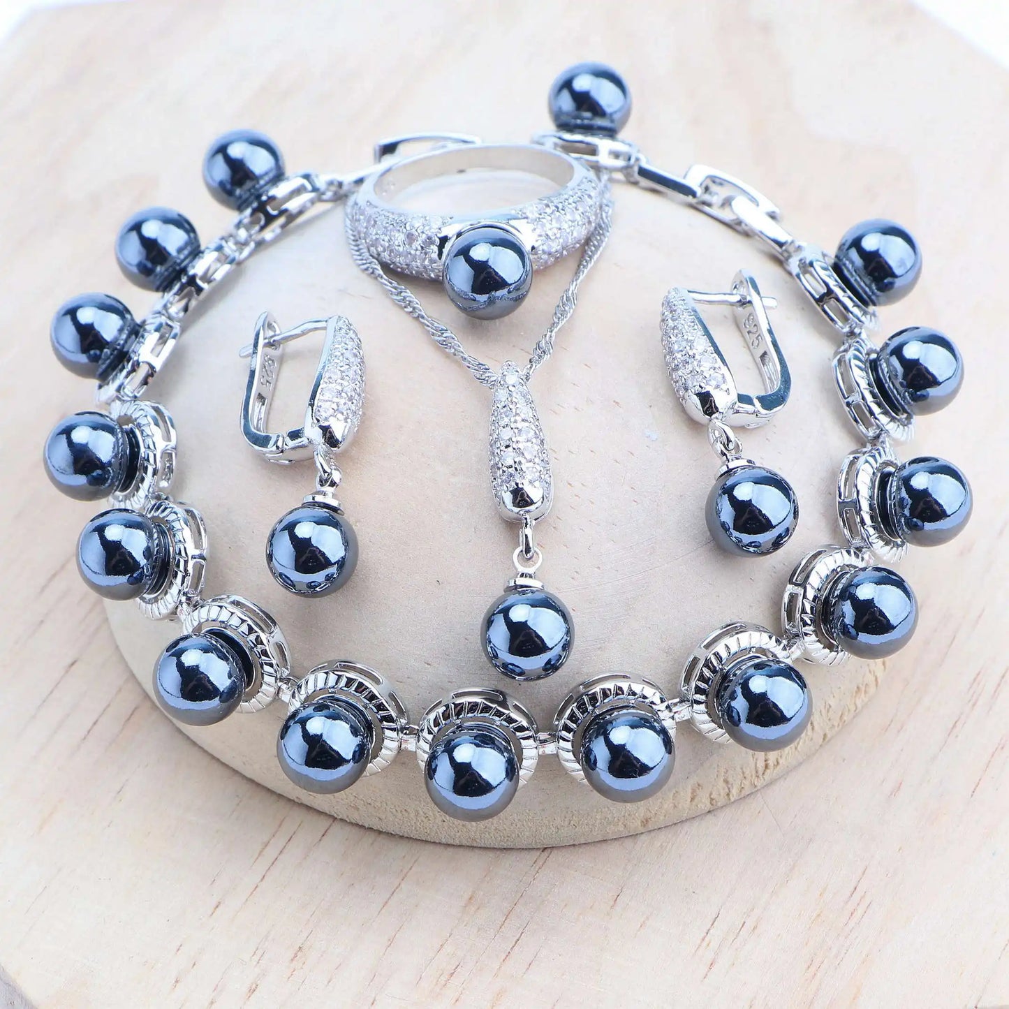 Platinum-plated .925 Sterling cultured Blue Pearl Four Piece Set (Necklace, earrings, bracelet and ring)