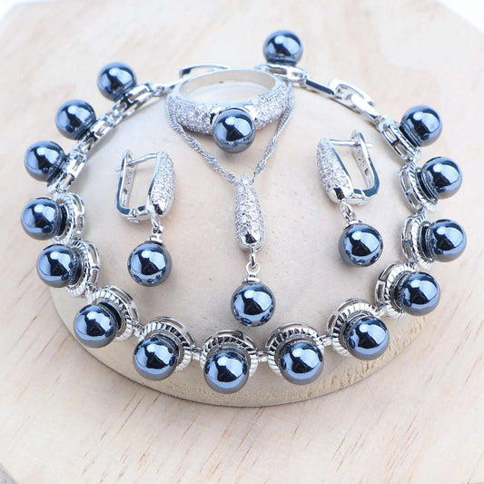 Platinum-plated .925 Sterling cultured Blue Pearl Four Piece Set (Necklace, earrings, bracelet and ring)
