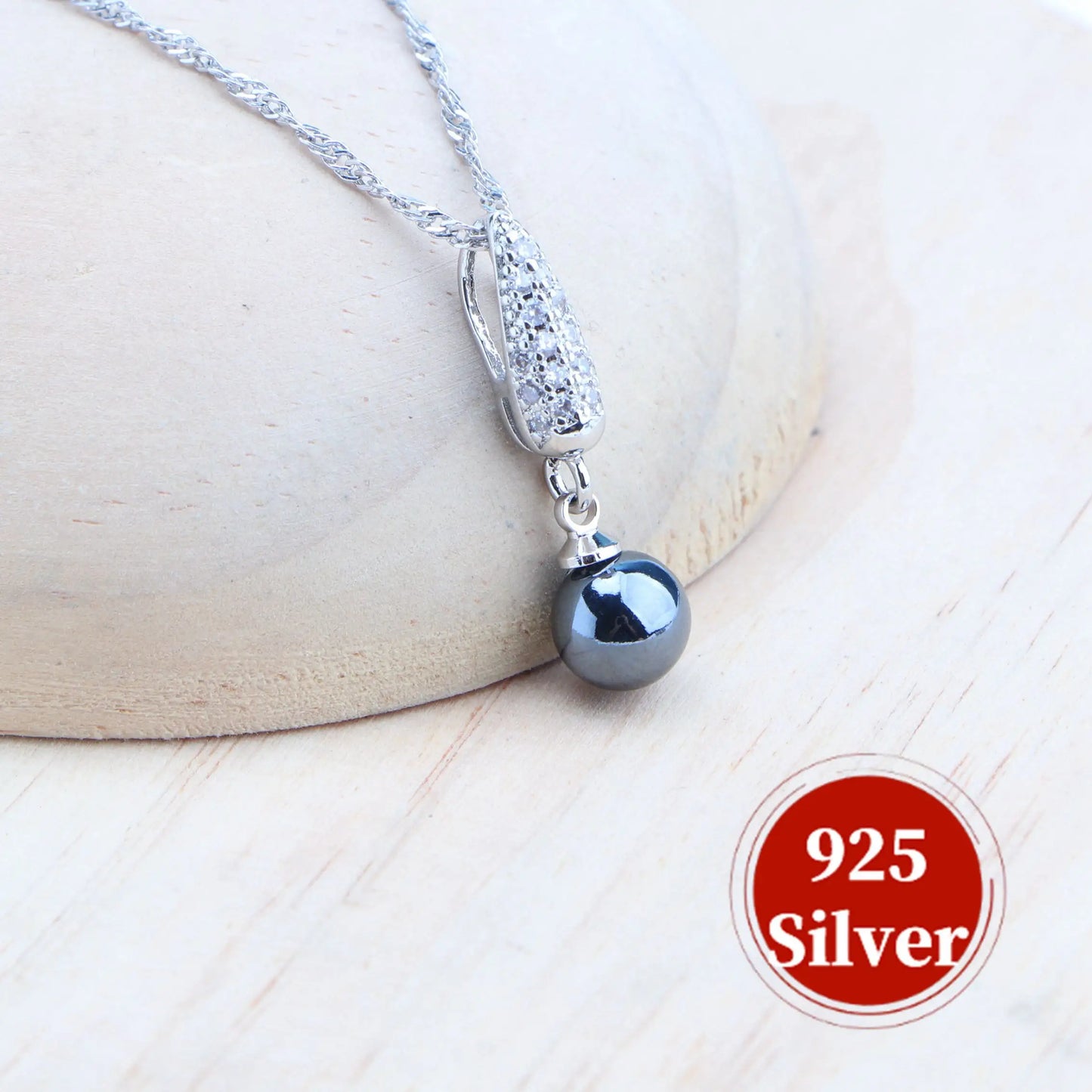 Platinum-plated .925 Sterling cultured Blue Pearl Four Piece Set (Necklace, earrings, bracelet and ring)