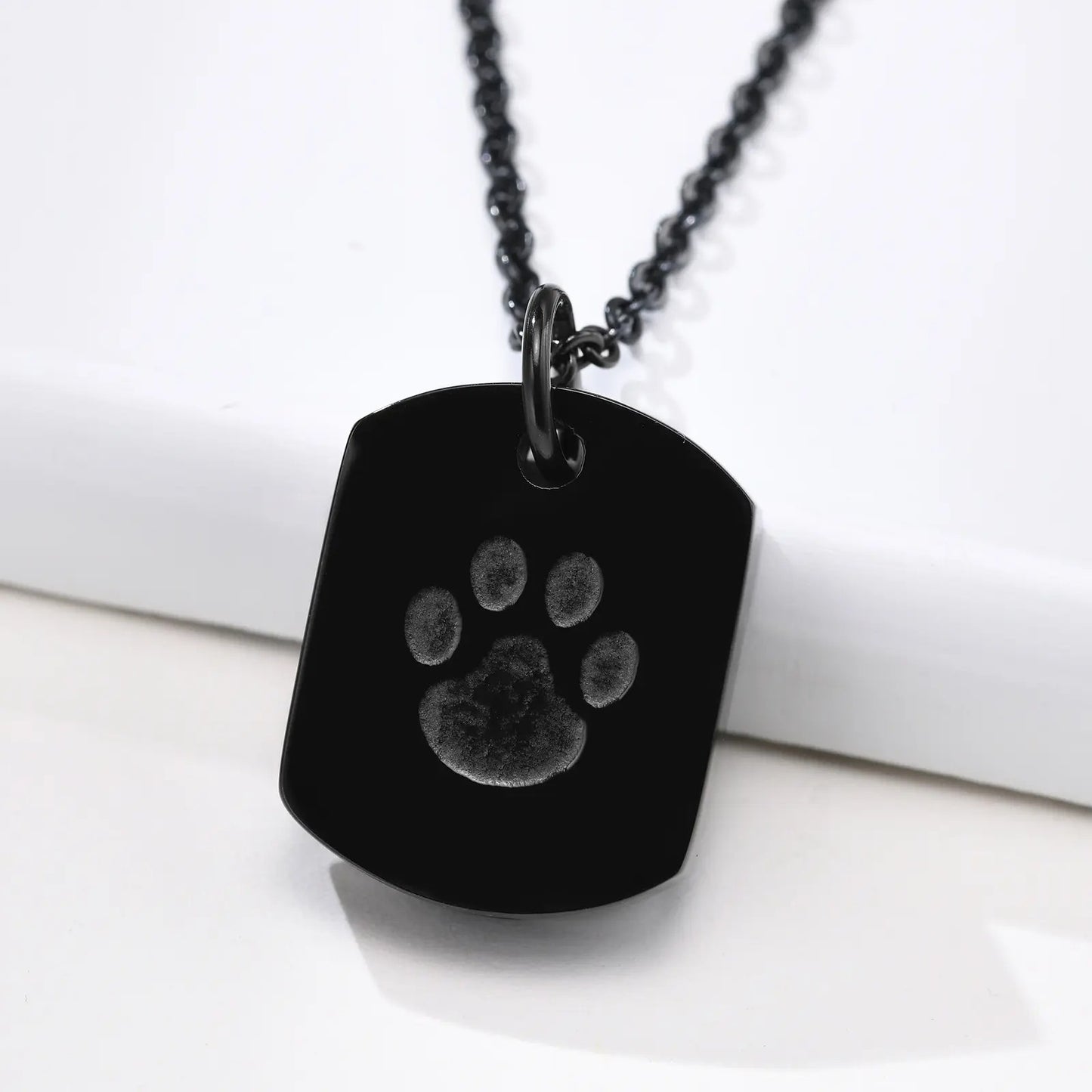 Stainless Steel Pawprint Necklace Urn in Black or Silver