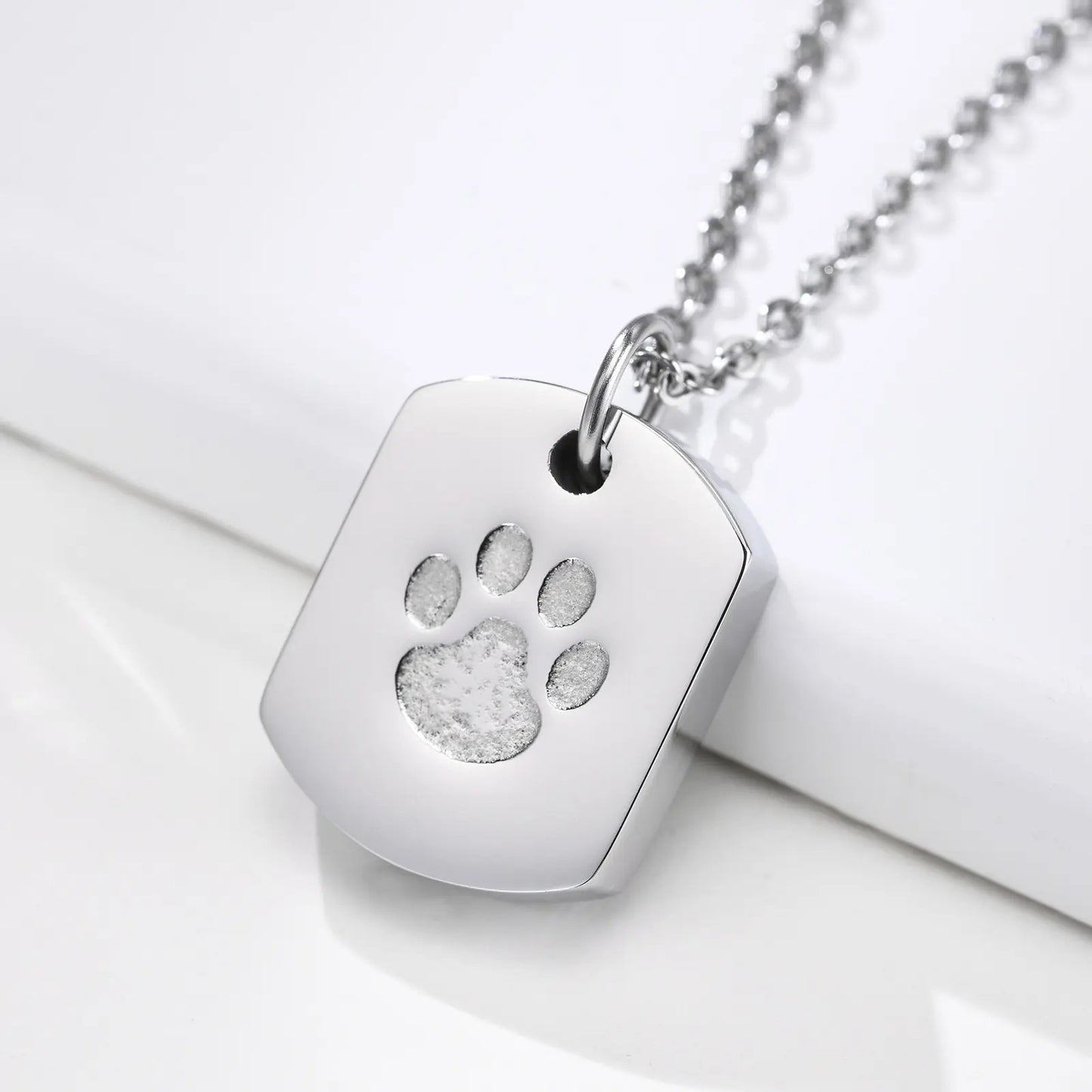 Stainless Steel Pawprint Necklace Urn in Black or Silver