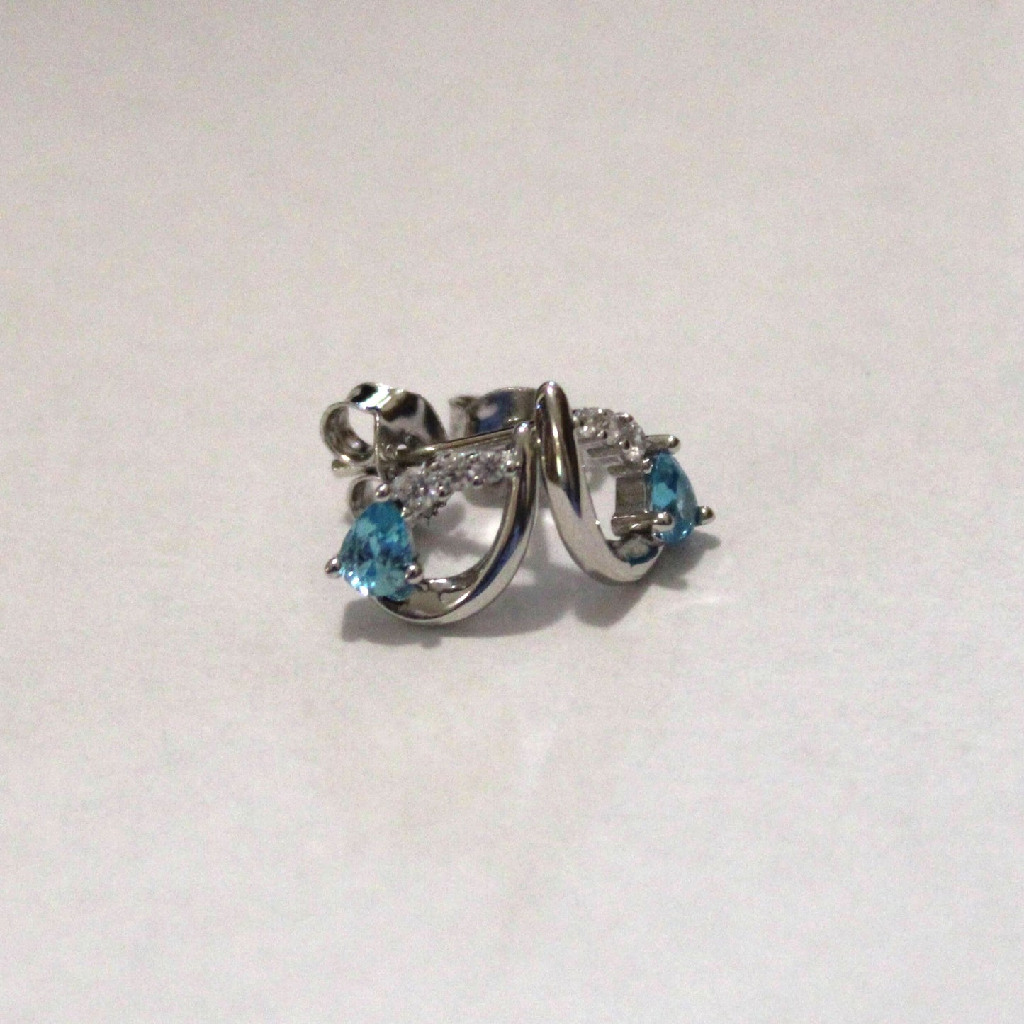 Nora: Rhodium-plated .925 Sterling Aquamarine Teardrop Earrings