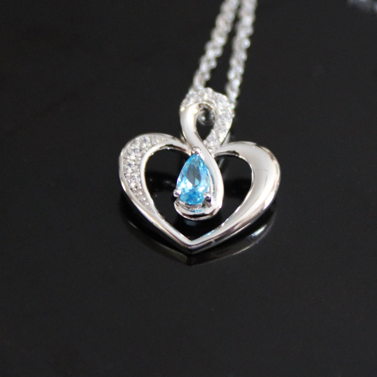 Elsie: Rhodium-plated .925 Sterling Blue Topaz Teardrop Heart Necklace