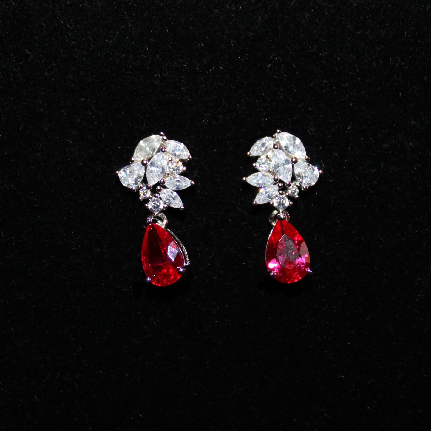 Theresa: Rhodium-plated .925 Sterling Marquise Diamond with teardrop Ruby Earrings