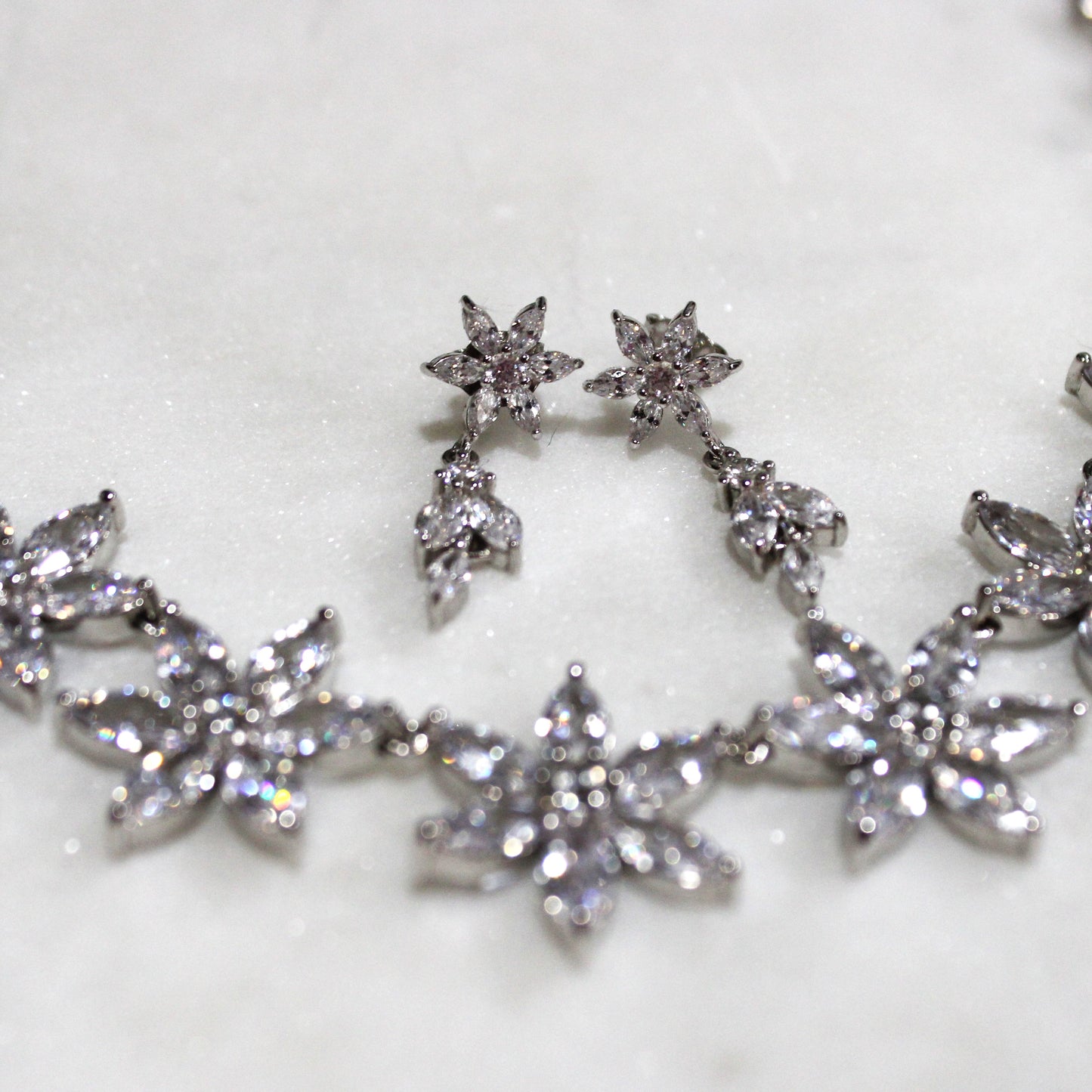 Veronica: Rhodium-plated .925 Sterling lab-created Marquise and Round Diamond Earrings