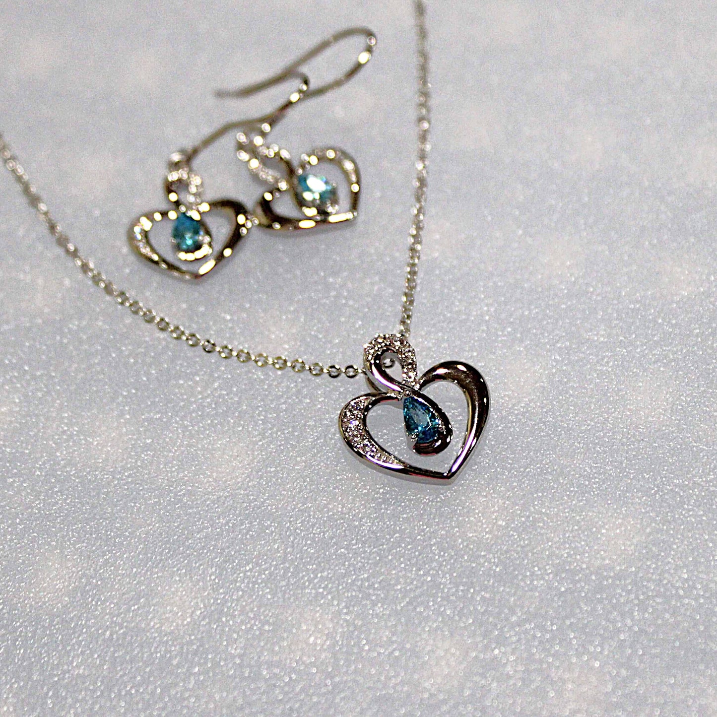 Elsie: Rhodium-plated .925 Sterling Blue Topaz Teardrop Heart Necklace