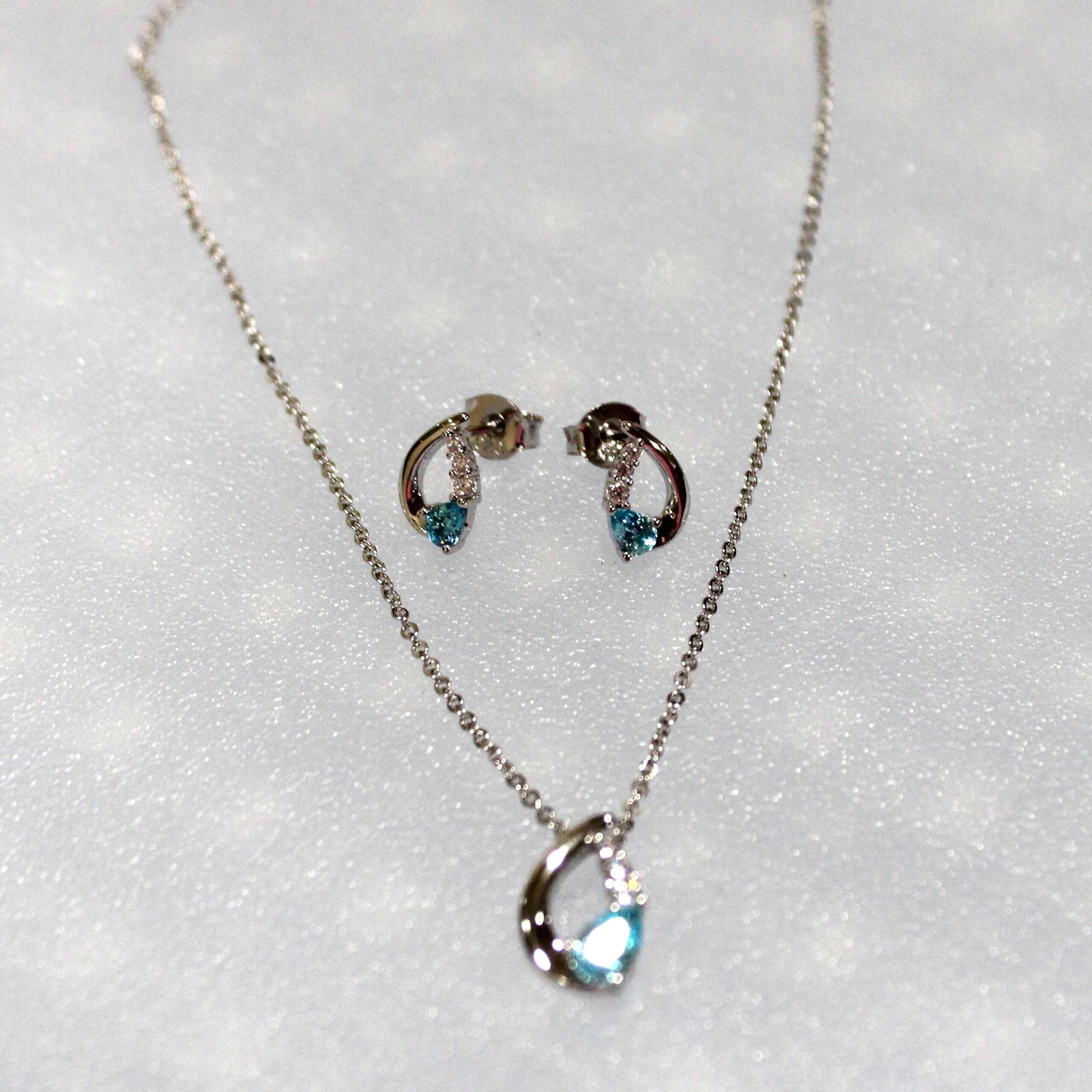 Nora: Rhodium-plated .925 Sterling Aquamarine Teardrop Earrings