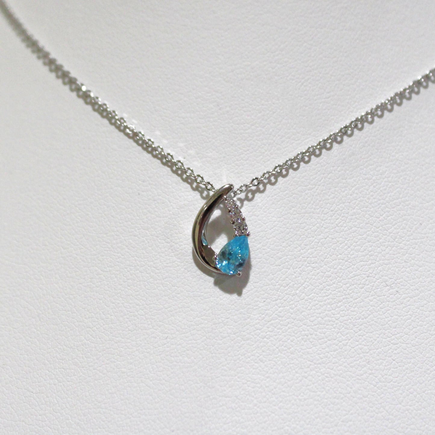Nora: Rhodium-plated .925 Sterling Aquamarine Teardrop Earrings