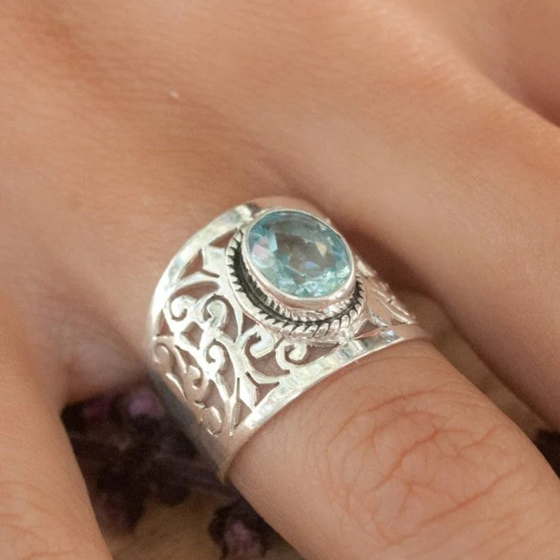 Silver Plated Band Ring with Oval Blue Topaz Cubic Zirconia