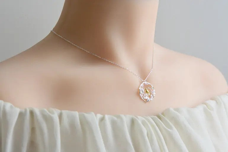 Rhodium-plated .925 Sterling Silver Bird in Floral Wreath Necklace